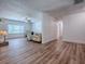 Open-concept living area showcasing the living room and transition to other spaces in the home at 9144 Sw 156Th Pl, Dunnellon, FL 34432