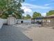 The backyard provides ample space with a firepit, pool, and a screened patio for year-round enjoyment at 9364 Se 164Th Pl, Summerfield, FL 34491
