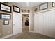 Bedroom with plush carpeting, a double closet and is decorated with aviation themed art at 946 Isle Of Palms Path, The Villages, FL 32162