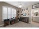 Carpeted home office with large window and view to ensuite bath at 946 Isle Of Palms Path, The Villages, FL 32162