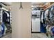 Organized walk-in closet featuring shelving, hanging rods, and built-in storage solutions at 946 Isle Of Palms Path, The Villages, FL 32162