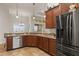 Kitchen featuring stainless steel appliances, granite countertops, and a breakfast bar at 10240 Kabana Blvd, Clermont, FL 34711