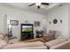Relaxing living room with comfortable seating, tile flooring, and ample natural light at 10240 Kabana Blvd, Clermont, FL 34711