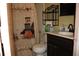 Charming bathroom featuring a decorative shower curtain and a vanity with storage at 1095 Golden Isle Dr, Mount Dora, FL 32757
