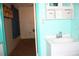 Bathroom featuring white vanity and view into an adjacent room at 1095 Golden Isle Dr, Mount Dora, FL 32757