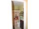 Bathroom featuring a shower with novelty shower curtain, vanity and toilet at 1095 Golden Isle Dr, Mount Dora, FL 32757