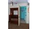 Bedroom featuring furniture and a view into an adjacent room at 1095 Golden Isle Dr, Mount Dora, FL 32757