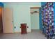 Bedroom with tile flooring, an open closet, and colorful curtains at 1095 Golden Isle Dr, Mount Dora, FL 32757