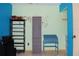 Spare bedroom featuring colorful walls, a desk and shelves at 1095 Golden Isle Dr, Mount Dora, FL 32757