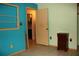Bright bedroom with tile flooring, colorful walls, and natural light at 1095 Golden Isle Dr, Mount Dora, FL 32757