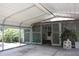 View of carport with lattice privacy screen at 1095 Golden Isle Dr, Mount Dora, FL 32757