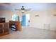 Open-plan living room featuring tile flooring and neutral paint at 1095 Golden Isle Dr, Mount Dora, FL 32757