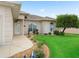 Charming front exterior with a well-manicured lawn, decorative landscaping, and inviting walkway at 11019 Se 170Th Lane Rd, Summerfield, FL 34491