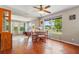 Charming dining area with view of the entryway, connecting living spaces in a home at 1119 Pine Ave, Tavares, FL 32778