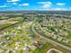 A scenic aerial view highlighting a charming home situated in a well-planned community at 11215 Se 172Nd Place, Summerfield, FL 34491