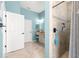 Bright bathroom with a vanity, lighting, and walk-in shower at 11215 Se 172Nd Place, Summerfield, FL 34491