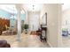 Inviting foyer with tile flooring, decorative columns, and view to dining room at 11215 Se 172Nd Place, Summerfield, FL 34491