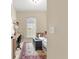 Bright office featuring a desk, a comfortable sofa, and a window offering natural light at 11215 Se 172Nd Place, Summerfield, FL 34491