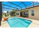 Sparkling pool with sundeck and a screened-in lanai, perfect for relaxation and entertaining at 11215 Se 172Nd Place, Summerfield, FL 34491