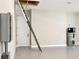 Garage with pull down ladder for attic access at 1127 Fiesta Key Cir, Lady Lake, FL 32159