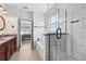 Open bathroom layout featuring a soaking tub, walk-in shower, and double sink vanity at 11313 Little Nellie Dr, Clermont, FL 34711