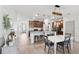Spacious kitchen with wooden cabinets, a large island with seating, and stainless steel appliances at 11313 Little Nellie Dr, Clermont, FL 34711