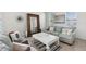 Inviting living room with a neutral color palette and ample seating, perfect for relaxation and entertaining at 11313 Little Nellie Dr, Clermont, FL 34711