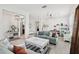 Open living area with unique light fixture and stylish decor, offering a comfortable and inviting atmosphere at 11313 Little Nellie Dr, Clermont, FL 34711
