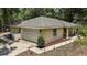 Aerial view of a single-story home featuring a two car garage at 11495 Se 71St Terrace Rd, Morriston, FL 32668