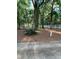 Scenic wooded homesite featuring a white fence and plenty of shade trees at 11495 Se 71St Terrace Rd, Morriston, FL 32668