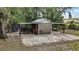 Outbuilding with plenty of covered parking for equipment or storage at 11495 Se 71St Terrace Rd, Morriston, FL 32668