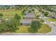 Beautiful aerial view showcases homes backing up to green space and community pools at 11601 Thacker Dr, Clermont, FL 34711