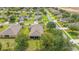 Aerial view showcasing the home's location in a well-manicured neighborhood at 11601 Thacker Dr, Clermont, FL 34711