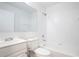 Clean bathroom features a tub with shower, vanity, and toilet at 1228 Padgett Cir, Lady Lake, FL 32159