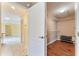 Walk-in closet with hardwood floors, shelving system, and plenty of storage space at 1282 Fort Lawn Loop, The Villages, FL 32162