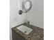 Updated bathroom featuring a granite vanity and modern fixtures at 1339 Orchid Ave, Winter Park, FL 32789
