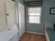 Cozy bedroom featuring a closet, wood floors, a daybed and a window for natural light at 1339 Orchid Ave, Winter Park, FL 32789