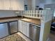 Well-lit kitchen area with stainless steel appliances and decorative glass block at 1339 Orchid Ave, Winter Park, FL 32789
