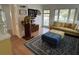 Comfortable living room featuring a mix of seating, natural light, and decorative elements at 1339 Orchid Ave, Winter Park, FL 32789