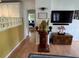 Bright living room with hardwood floors, TV and comfortable furniture at 1339 Orchid Ave, Winter Park, FL 32789
