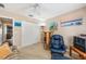 Bedroom featuring a closet, recliner, and decorative artwork at 13643 Se 89Th Ct, Summerfield, FL 34491