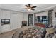 Inviting bedroom featuring soft lighting, built-in storage, and a picturesque window view for a relaxing ambiance at 1956 Brantley Cir, Clermont, FL 34711