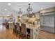 Gourmet kitchen with two islands, stainless appliances, and custom cabinetry at 1956 Brantley Cir, Clermont, FL 34711