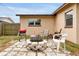 Outdoor patio includes fire pit, seating, and a grill; great for backyard entertaining at 2007 Mosher Dr, Orlando, FL 32810