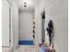Hallway provides access to other areas of the home and offers convenient built-in shelving at 2022 Edgewood Rd, Leesburg, FL 34748