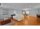 Cozy living room features hardwood floors and plenty of natural light at 2022 Edgewood Rd, Leesburg, FL 34748