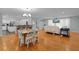 Open-concept living space connects the kitchen, dining, and living room areas at 2022 Edgewood Rd, Leesburg, FL 34748