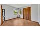 Well-lit bedroom with built in storage and two large windows at 2104 Winding Ridge S Ave, Kissimmee, FL 34741
