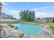 Well-maintained pool offering ample space for recreation and relaxation in the backyard at 2104 Winding Ridge S Ave, Kissimmee, FL 34741