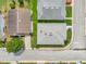 Overhead view of neighborhood houses, showing roof lines, landscaping, and street layout at 2235 Harbor Town Ln, Lakeland, FL 33810